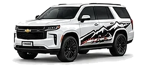 Chevrolet Tahoe in Summit White with Chevrolet performance vinyl graphics, front three-quarter view on a white background.