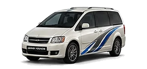 Chrysler Grand Voyager in Velvet Pearl with blue and silver vinyl side graphics, front three-quarter view on a white background.