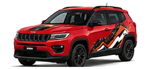 Jeep Compass in Firecracker Red with custom vinyl graphics, front three-quarter view.