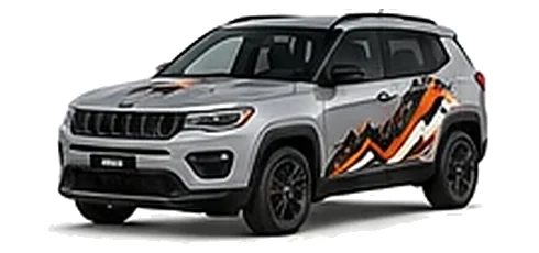 Jeep Compass in Silver Zynith with custom vinyl graphics, front three-quarter view.