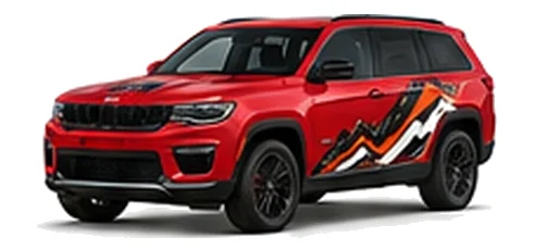 Jeep Grand Cherokee in Firecracker Red with custom vinyl graphics, front three-quarter view.