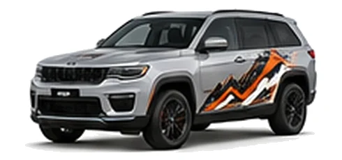 Jeep Grand Cherokee in Silver Zynith with custom vinyl graphics, front three-quarter view.