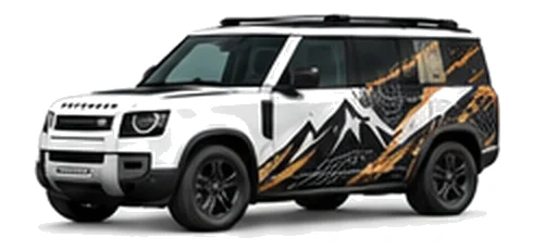 Land Rover Defender 110 in Fuji White with mountain and contour-inspired vinyl side graphics, front three-quarter view on a white background.