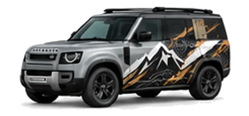 Land Rover Defender 110 in Eiger Grey with mountain and contour-inspired vinyl side graphics, front three-quarter view on a white background.