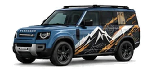 Land Rover Defender 110 in Tasman Blue with mountain and contour-inspired vinyl side graphics, front three-quarter view on a white background.