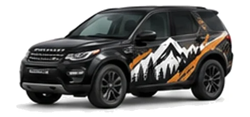 Land Rover Discovery Sport in Santorini Black with mountain and contour-inspired vinyl side graphics, front three-quarter view on a white background.