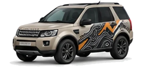 Land Rover Freelander in Gondwana Stone with mountain and contour-inspired vinyl side graphics, front three-quarter view on a white background.