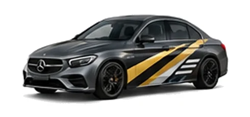 Mercedes-Benz E-Class in Selenite Grey with contrasting gold, white and black diagonal vinyl side graphics, front three-quarter view on a white background.