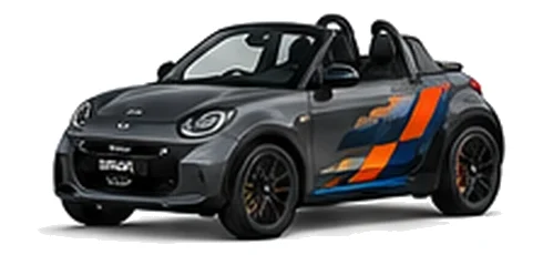 Smart Roadster in Graphite Grey with orange, white and black pixel-style vinyl side graphics, front three-quarter view on a white background.