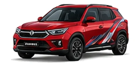 SsangYong Korando in Cherry Red with red, white and black angular vinyl side graphics, front three-quarter view on a white background.