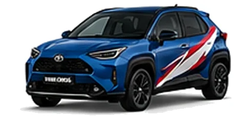 Toyota Yaris Cross in Juniper Blue with red, white and black rally-style vinyl side graphics, front three-quarter view on a white background.
