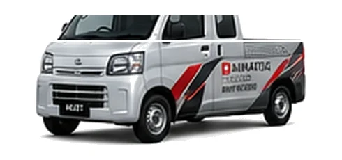 Daihatsu Hijet Deck Van in silver with custom van vinyl graphics, front three-quarter view.