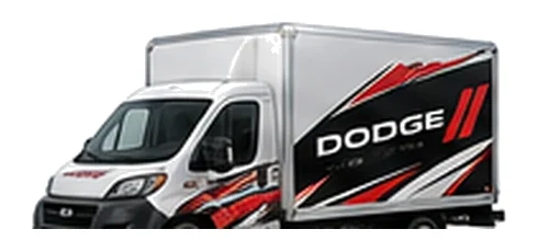 Dodge ProMaster Cutaway in white with custom van vinyl graphics, front three-quarter view.