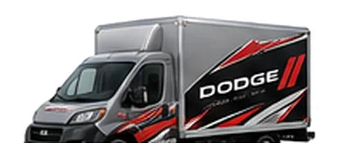 Dodge ProMaster Cutaway in grey with custom van vinyl graphics, front three-quarter view.