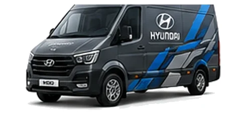 Hyundai H350 in grey with custom van vinyl graphics, front three-quarter view.