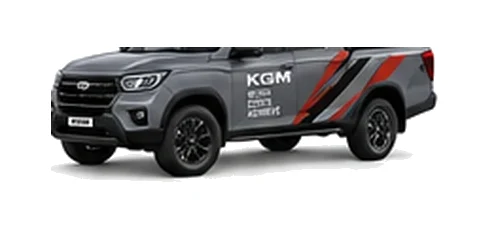 KGM Musso in grey with custom van vinyl graphics, front three-quarter view.