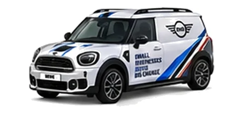Mini Countryman Commercial in white with custom van vinyl graphics, front three-quarter view.