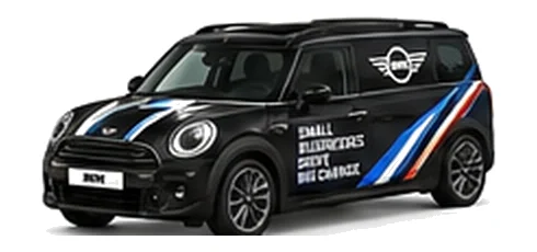 Mini Traveller Van in black with custom van vinyl graphics, front three-quarter view.