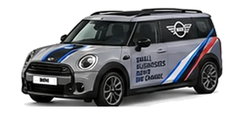 Mini Traveller Van in grey with custom van vinyl graphics, front three-quarter view.