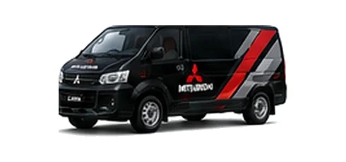 Mitsubishi L400 in black with custom van vinyl graphics, front three-quarter view.