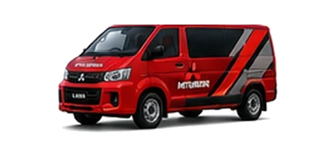 Mitsubishi L400 in red with custom van vinyl graphics, front three-quarter view.