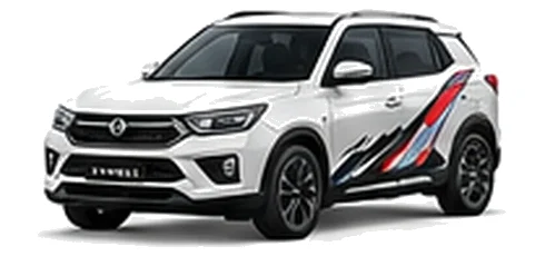 Ssangyong Korando Commercial in Grand White with custom van vinyl graphics, front three-quarter view.