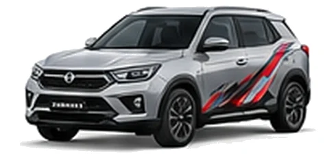 Ssangyong Korando Commercial in Silent Silver with custom van vinyl graphics, front three-quarter view.