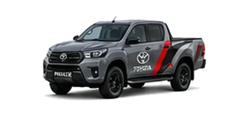 Toyota Hilux in grey with custom van vinyl graphics, front three-quarter view.