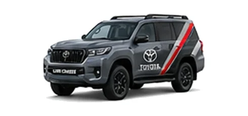 Toyota Land Cruiser Commercial in grey with custom van vinyl graphics, front three-quarter view.