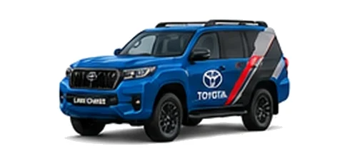 Toyota Land Cruiser Commercial in blue with custom van vinyl graphics, front three-quarter view.